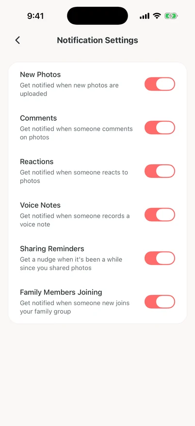 Clann Notification Settings with a separate switch for each kind of update, including New Photos, Comments, Reactions, Sharing Reminders and Family Members Joining.