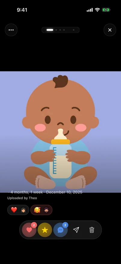 Clann full-screen photo viewer showing a baby illustration, an age of 4 months and 1 week, a capture date, uploader, reactions, favourite and comment controls.
